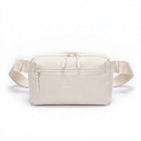 Zeeksack Crossbody Organizer (sand white) – skulderrem og forlomme med lynlås.