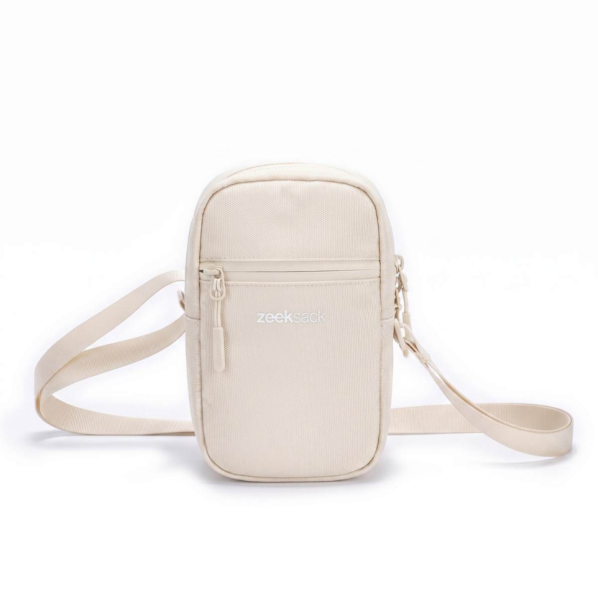 Zeeksack Travel Pouch (sand white) – skulderrem og forlomme med lynlås.