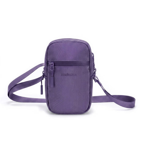 Zeeksack Travel Pouch (lilla) – skulderrem og forlomme med lynlås.